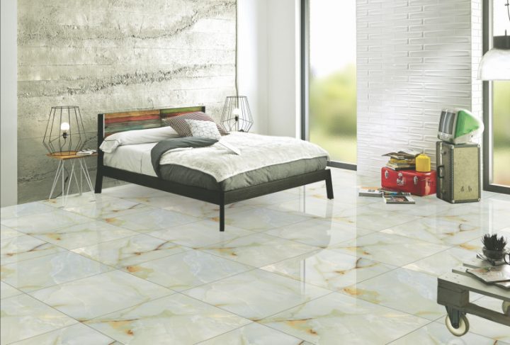 Dormitorio con pavimento porcelánico imitación marmol ONIX